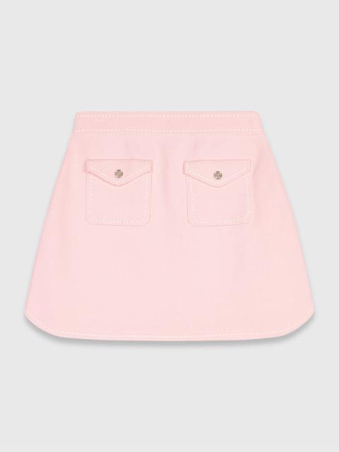 maje Short topstitched knit skirt