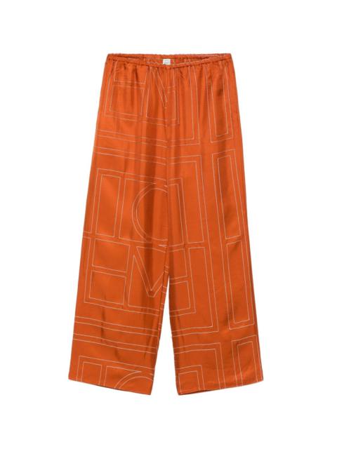 TOTEME Monogram silk pajama pants