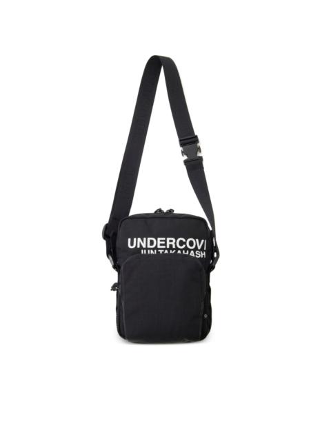 UNDERCOVER logo-print shoulder bag