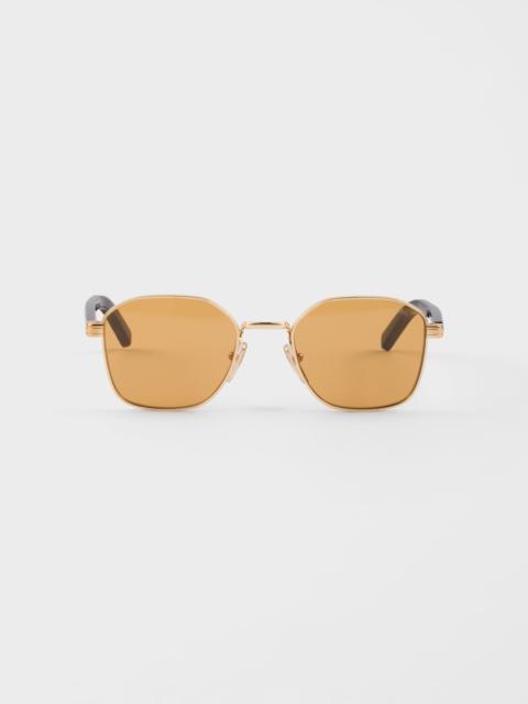 Prada Sunglasses with the iconic metal plaque