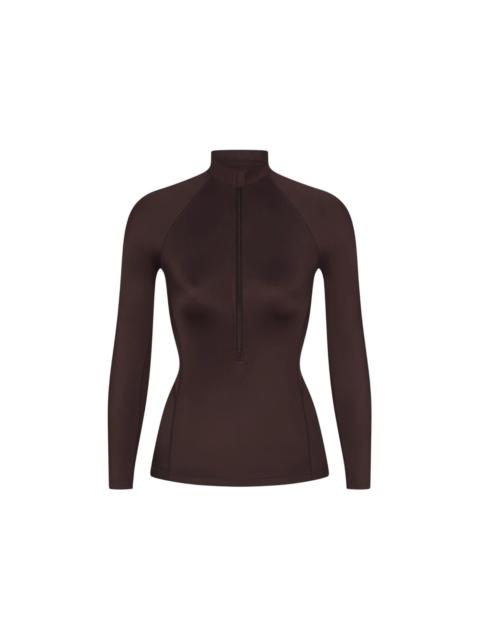 Nike Nike x SKIMS Women's Shine Long Sleeve Half Zip Top Phoenix