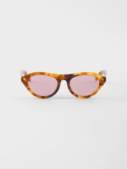 Prada Prada sunglasses with the iconic metal plaque