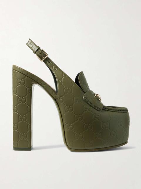 Horsebit-embellished logo-debossed leather platform slingback pumps