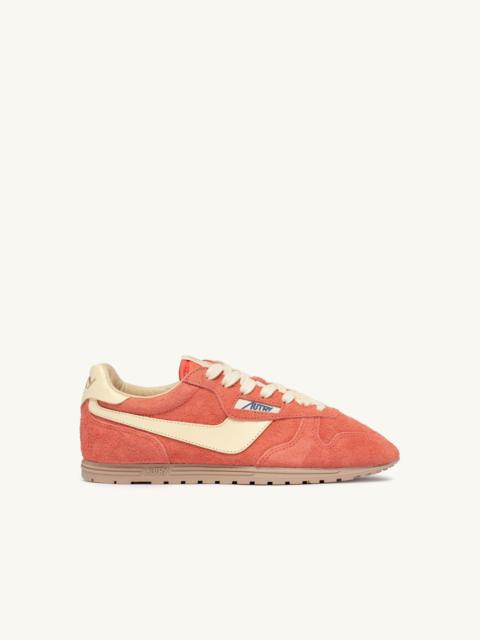AUTRY WINDSPIN SNEAKERS IN BLUSH AND RUTABAGA SUEDE AND LEATHER