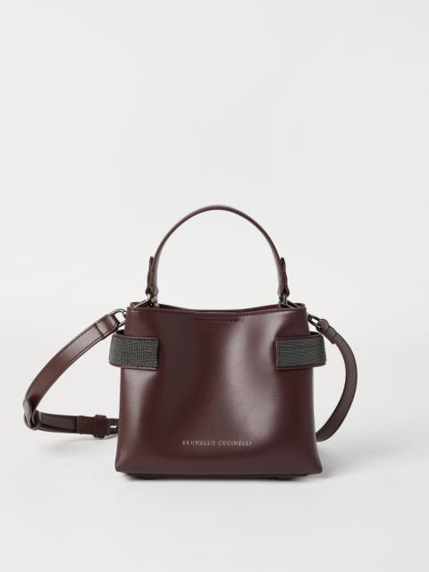 Brunello Cucinelli Essence small top-handle bag in calfskin with precious bands