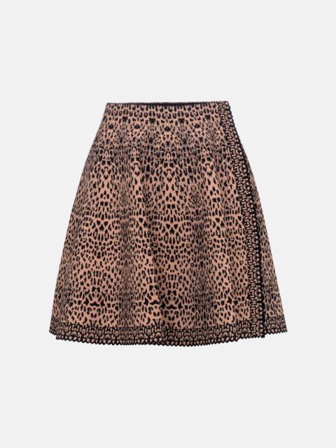 Alaïa Leopard-jacquard stretch-knit miniskirt