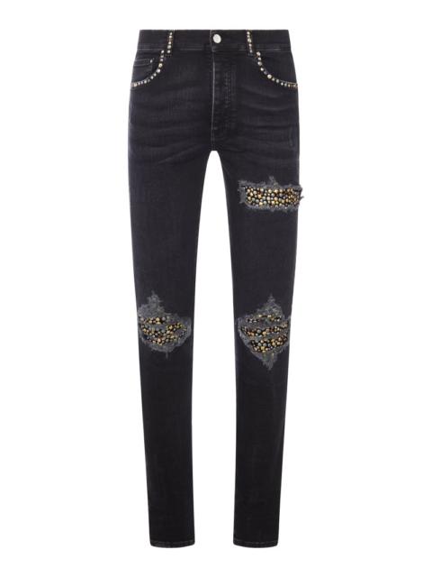 AMIRI Amiri Men Skinny Jeans With Studs And Destroy Details