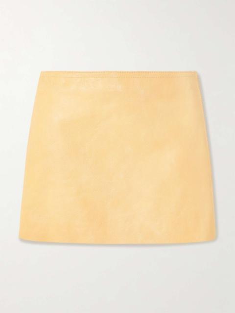 Textured-leather mini skirt