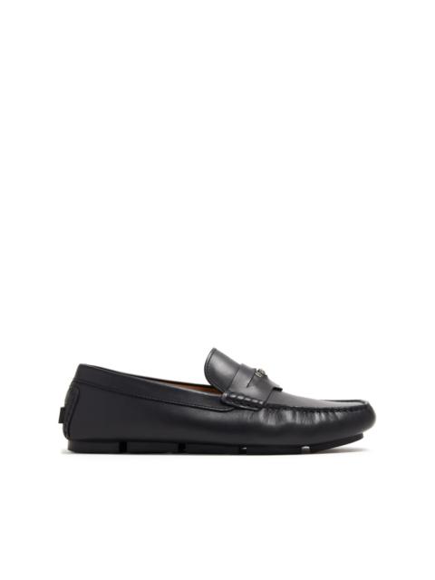 Medusa-plaque leather loafers