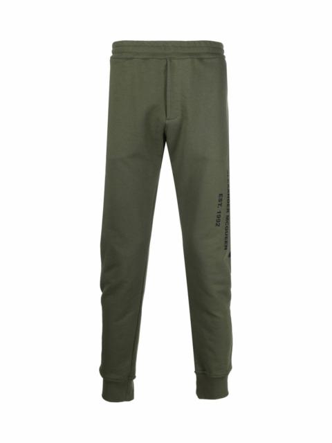 Alexander McQueen LOGO PRINT TAPERED TRACK TROUSERS