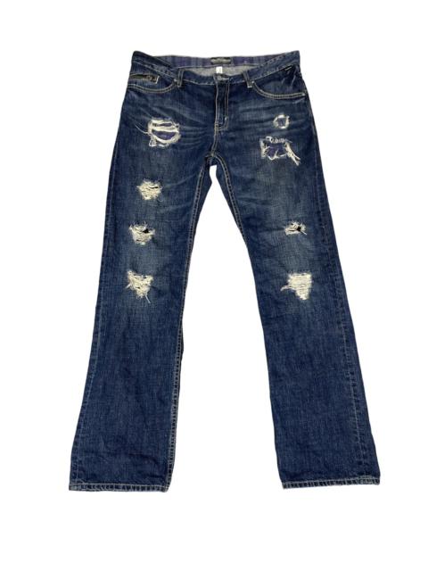 Other Designers Archival Clothing - Montage Distressed Denim Jeans. S0217