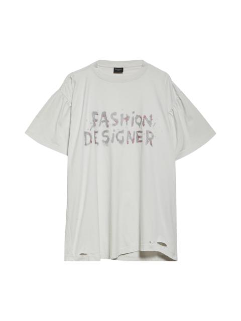 BALENCIAGA Balenciaga Shifted Distressed Graphic T-Shirt in Dirty White at Nordstrom