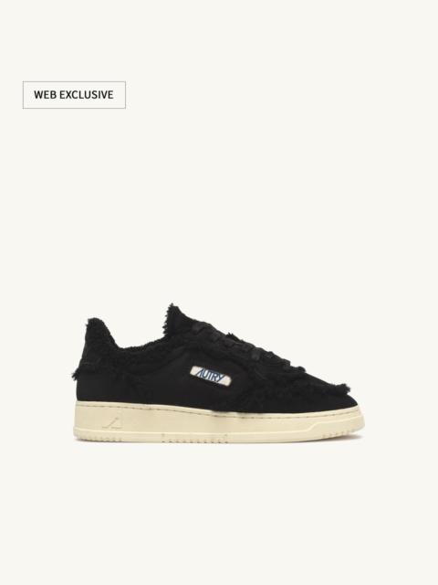 AUTRY MEDALIST MUTTON SNEAKERS IN BLACK SUEDE AND SHEARLING