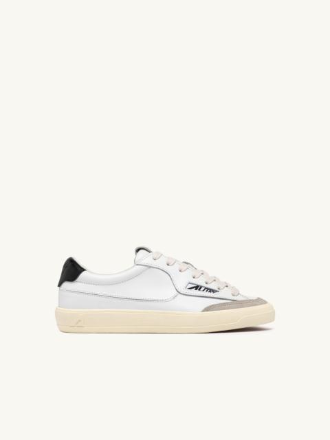 AUTRY WINDSCAPE LOW SNEAKERS IN WHITE AND BLACK LEATHER