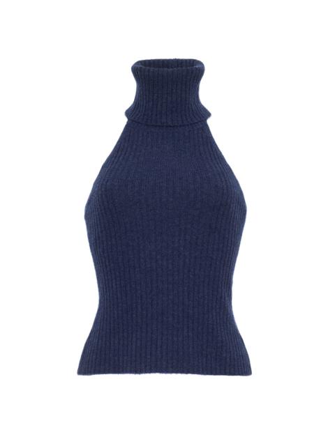 Cara Cara Samson Top
Statement Elegance: Form-Fitting Ribbed Knit Halter with an Open Back and Luxurious Overs