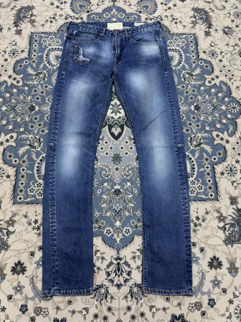 Other Designers Distressed Denim - Jimmy Taverniti Blackie Studded Patchwork Jeans