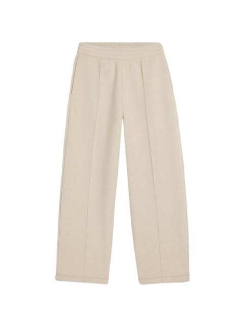 high-waisted pleated trousers