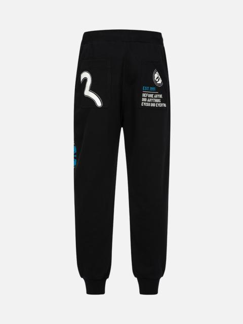 EVISU HAND-STITCHED AND MULTI-PRINT RELAX FIT SWEATPANTS