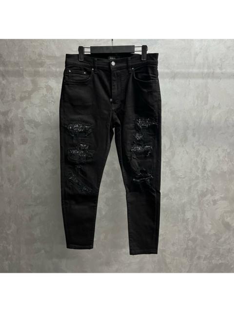 AMIRI Amiri Black Solid-Color Denim Jeans with Rhinestone Accents and Patchwork Details