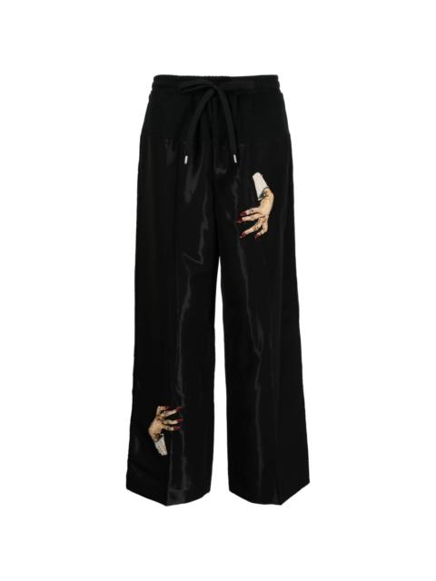 UNDERCOVER hand-embroidered satin trousers