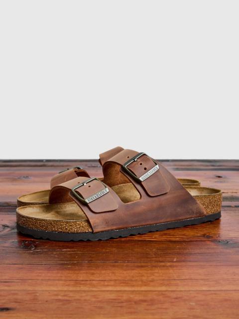 BIRKENSTOCK Arizona Sandal in Cognac Oiled Leather
