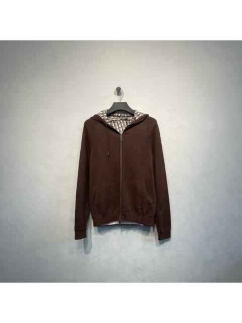 Dior Dior brown hooded jacket with all-over logo print and zipper closure.