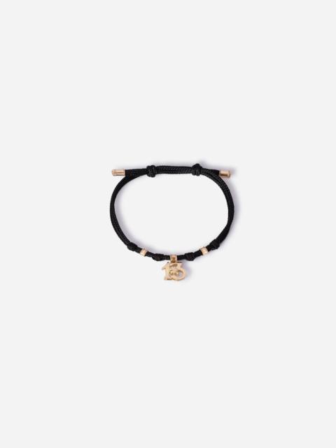 Dolce & Gabbana Good Luck Bracelet fabric with a pendant in 18 carat yellow gold