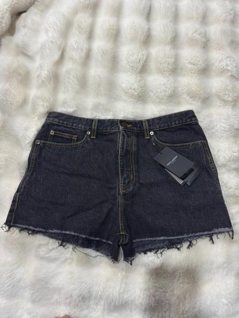 SAINT LAURENT Brand new Saint Laurent (SLP) distressed denim shorts with fringe detail.