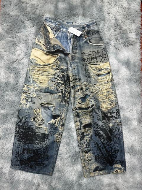 Acne Studios Acne Studios Full Width Graffiti Printed Ripped Jeans