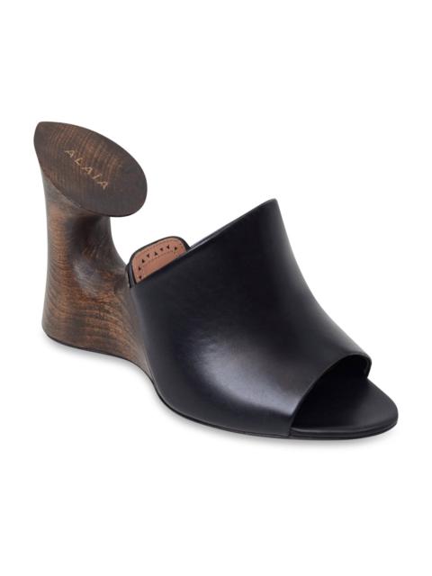 Alaïa LA SCULPTURE CALFSKIN AND WOOD 100MM MULE | BLACK