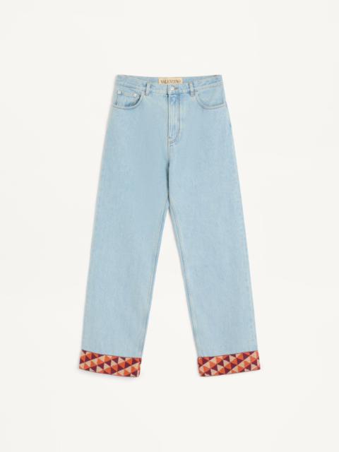 DENIM PANTS WITH JACQUARD HEM