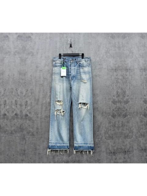 CELINE Celine's new washed and distressed ice blue denim jeans