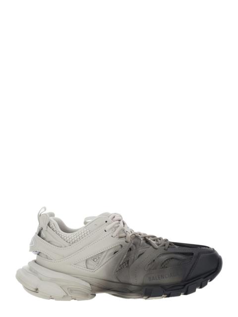BALENCIAGA Balenciaga Men 'Track' Black And White Low Top Sneakers With Logo Lettering On The Tongue In Tech Fa