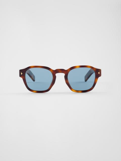 Prada Sunglasses with the iconic metal plaque