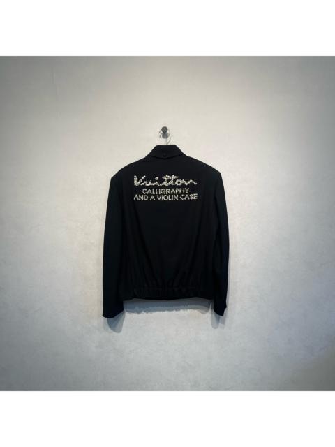 Louis Vuitton Louis Vuitton blazer with pearl button logo on the back.