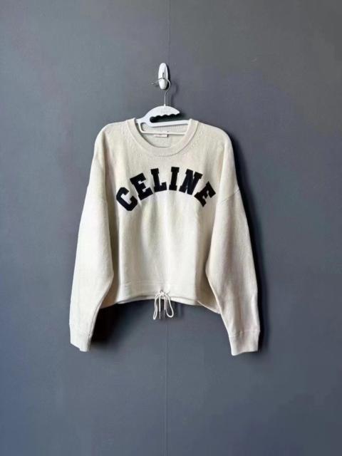 CELINE Celine off-white cashmere sweater with letter detailing.