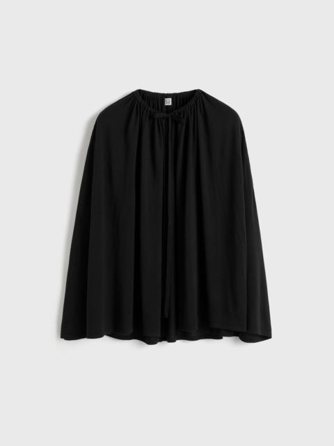 Drawstring cape black