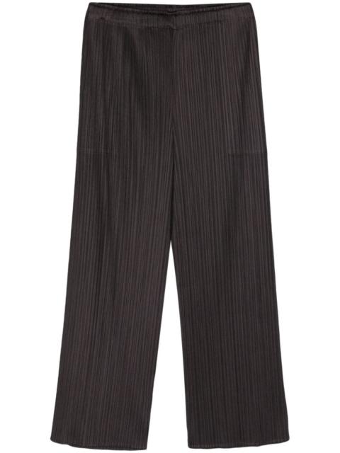 Pleats Please Issey Miyake Pleated cropped trousers