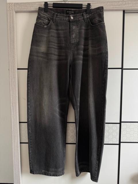 BALENCIAGA Balenciaga large baggy rubber-coated waxed jeans