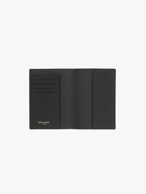 SAINT LAURENT TINY CASSANDRE PASSPORT CASE IN GRAINED LEATHER