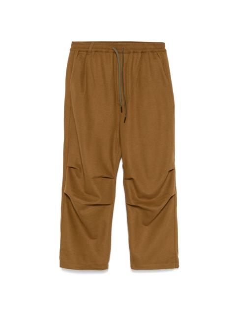 White Mountaineering knee-tuck trousers