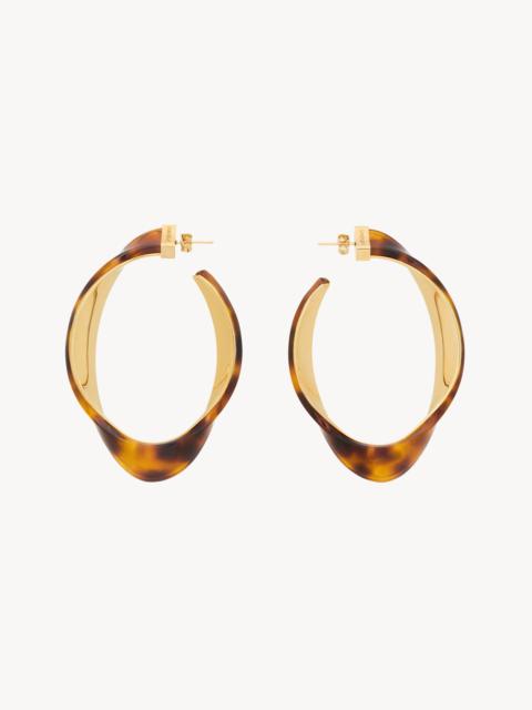 SAINT LAURENT TWISTED TORTOISESHELL HOOP EARRINGS IN RESIN