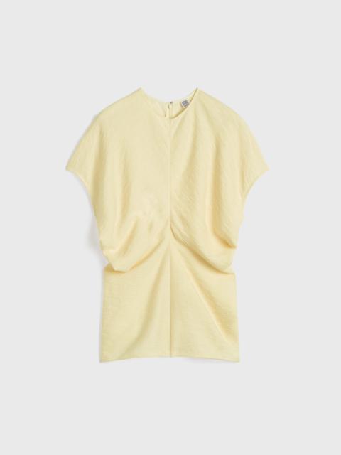 TOTEME Slouch waist basketweave top straw