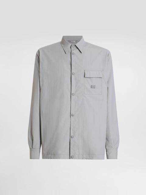 Technical fabric jacket with tag