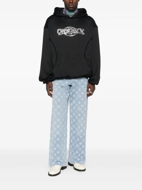 CASABLANCA monogram-pattern jeans