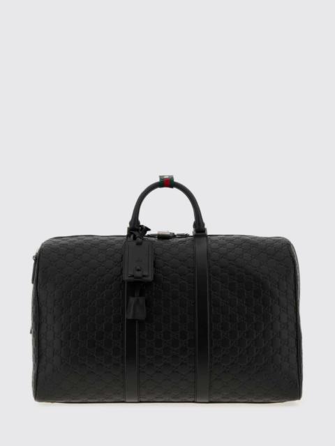 GUCCI Gucci Men Gucci Gg Emblem Travel Bag In Leather With Embossed Gg Monogram