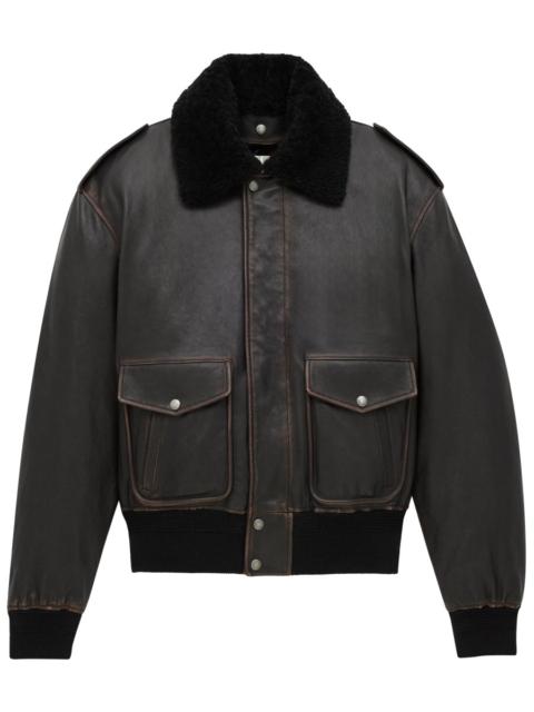 SAINT LAURENT LEATHER AND SHEARLING BOMBER JACKET