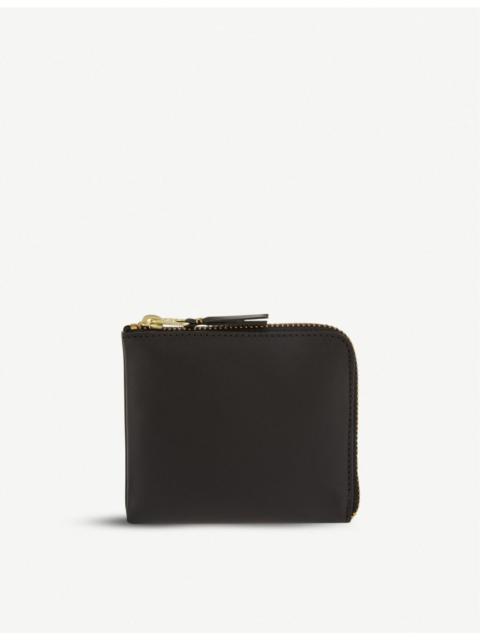 Comme Des Garçons Leather half-zip wallet