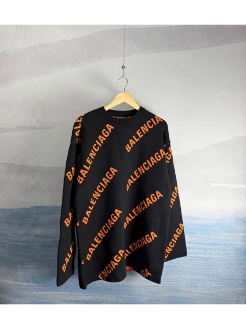 BALENCIAGA Balenciaga Black and Orange All-Over "Barrage" Print Wool Sweater
