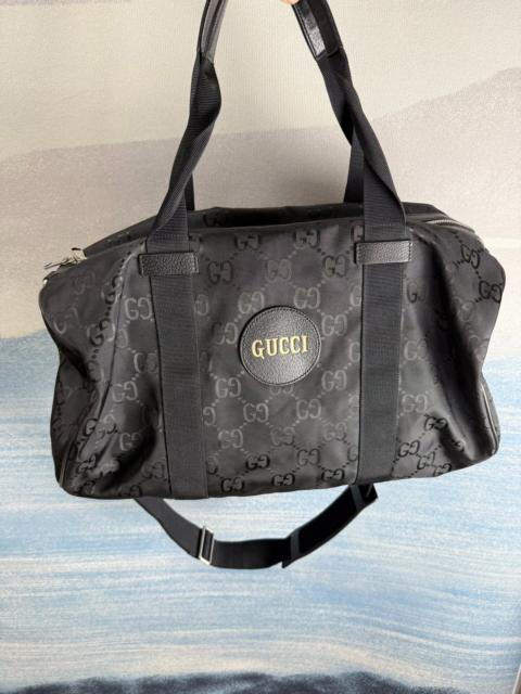 GUCCI Gucci Off The Grid black travel bag in all-over print nylon with leather trim.